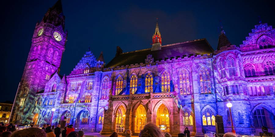 Rochdale Town Hall illuminated during the opening event.