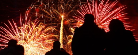 Family watching fireworks.