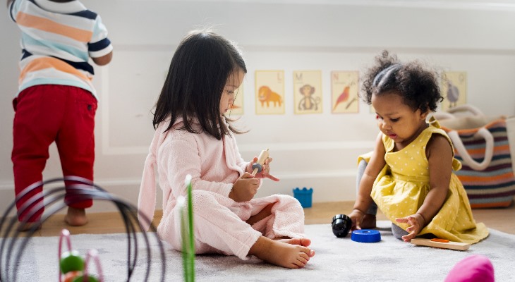 Children playing in a nursery.