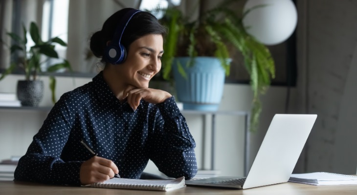 Computer user with headphones.