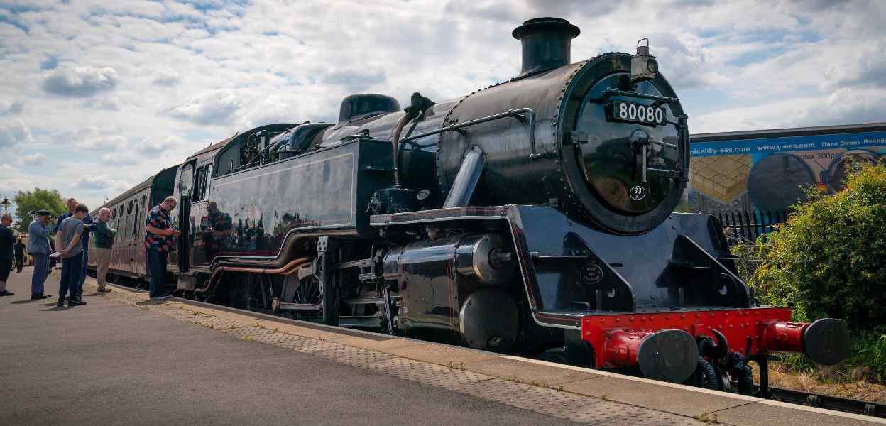 Steam locomotive at a East Lancashire Railway station.