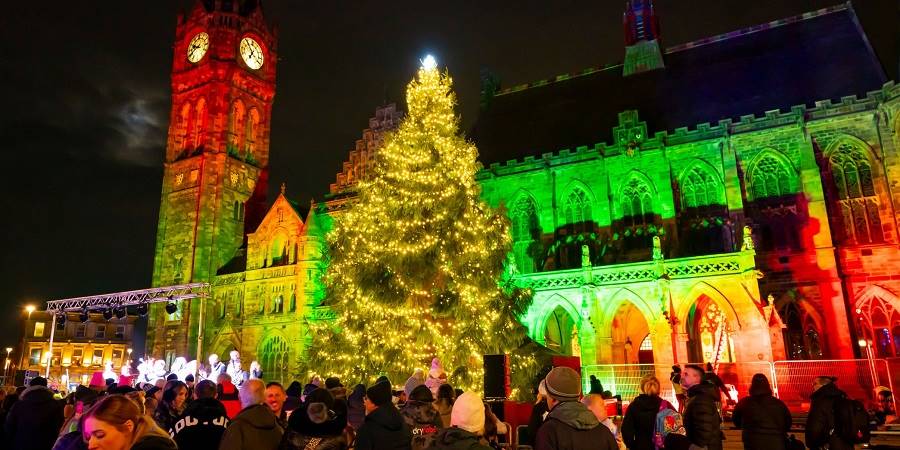 Rochdale Town Hall lit up in festive colours.