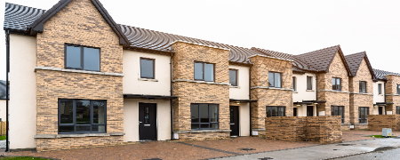 A row of newly built houses.