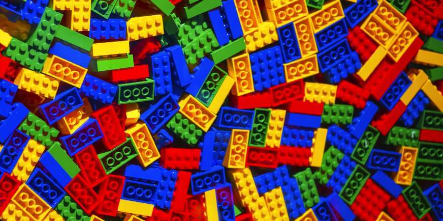 A pile of Lego bricks in assorted sizes and colours.
