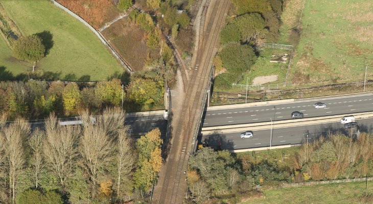 Rail bridge over M62 at Castleton.