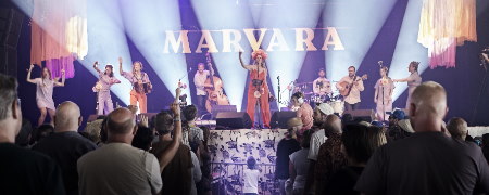 Marvara performing on stage.