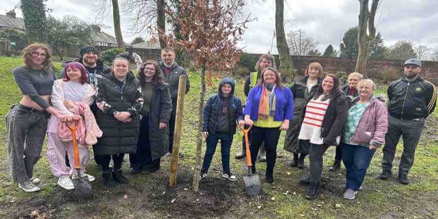 Councillor Rachel Massey and young people.