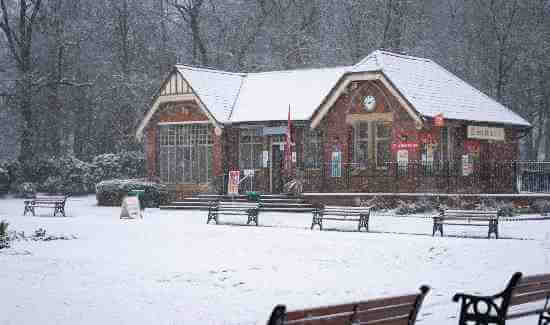 Queens Park cafe covered in snow.