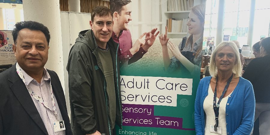 Councillor Iftikhar Ahmed with a resident and member of adult care staff.