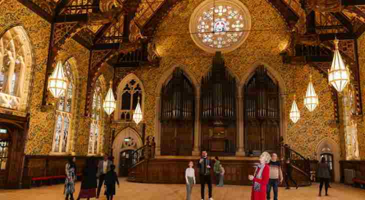 Visitors exploring the Great Hall.