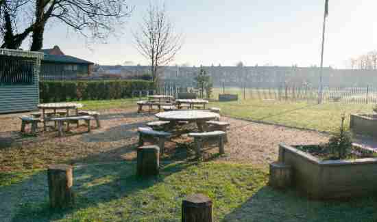 Benches at Hopwood Park on a frosty morning.