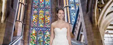 Bride stood on the Grand Staircase in Rochdale Town Hall.