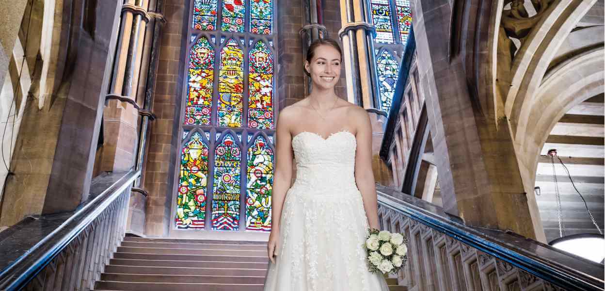 Bridge standing on Grand Staircase in Rochdale Town Hall.