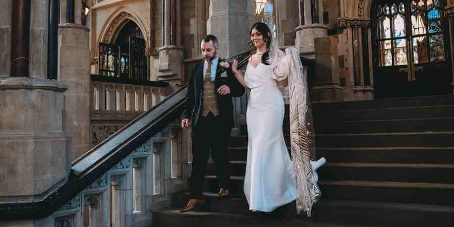 Bride walking down the Grand Staircase in Rochdale Town Hall.