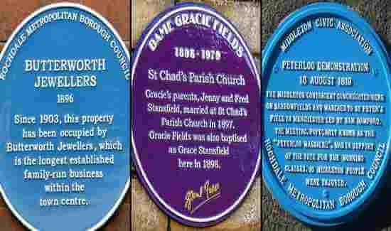 Blue and purple plaques to commemorate - Butterworth Jewellers, Dame Gracie Fields and Peterloo demonstration.