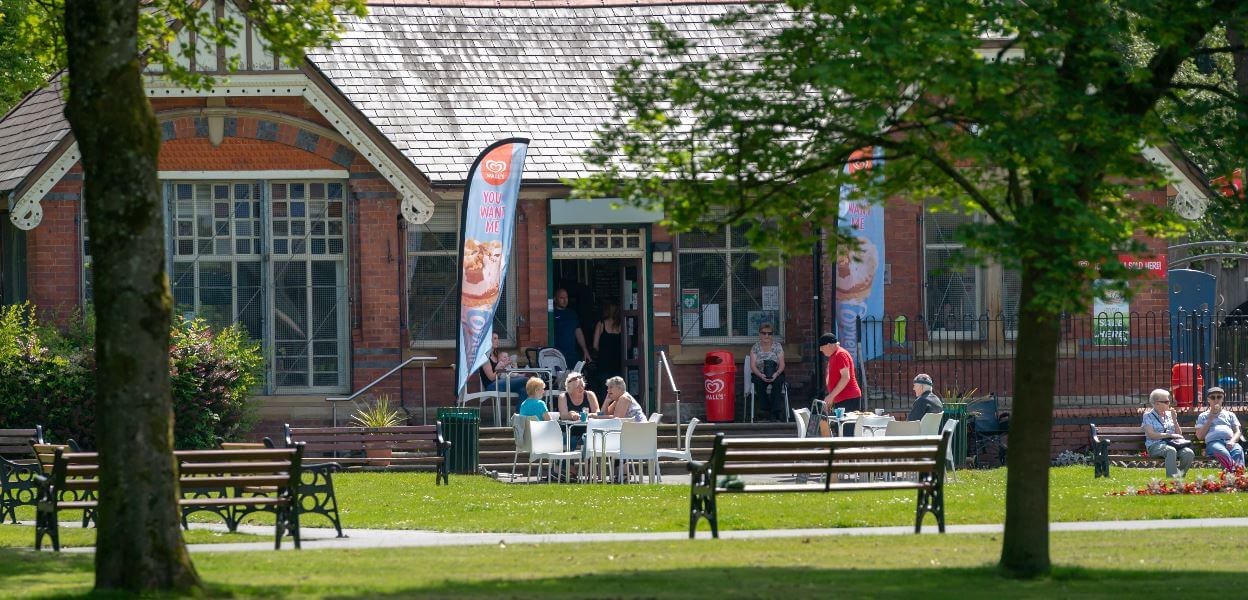 People enjoying Queens park